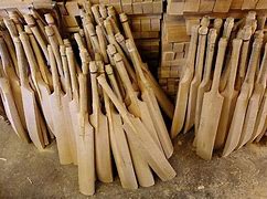 Image result for Cricket Bat Wood Rubber Ball