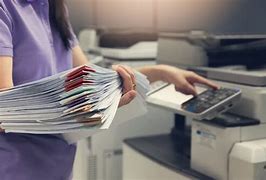Image result for Person Scanning Documents