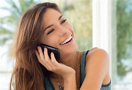 Image result for Woman Answering a Mobile Phone