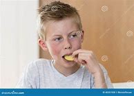 Image result for Boy Eating Candy