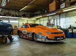 Image result for Home Garage with TV and Pro Stock Drag Car