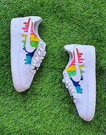 Image result for Rainbow Nike Shoes On a Whit Shelf