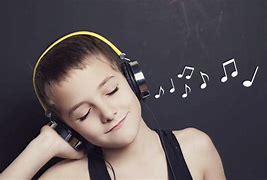 Image result for Child Listening to Music with Headphones