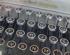 Image result for Image of Typewriter with Clogged Up Keys