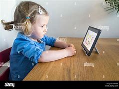Image result for Little Kid Watching iPad
