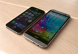 Image result for HTC One vs iPhone 5