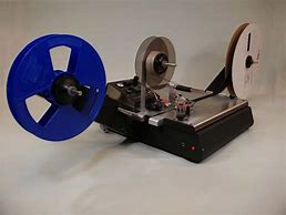 Image result for Tape and Reel Packaging Machine