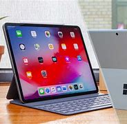 Image result for Surface Pro 7 vs iPad Pro 2021