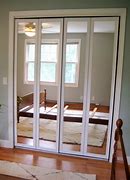 Image result for Mirrored Bifold Doors
