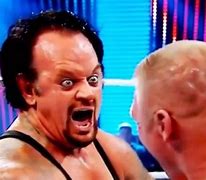 Image result for Undertaker Brock Lesnar