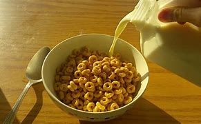 Image result for Cereal Bowl with Milk Being Poured In