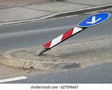 Image result for Broken Road Surface Sign