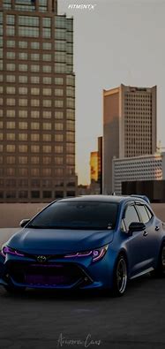 Image result for 2019 Toyota Corolla Hatchback Bronze SE