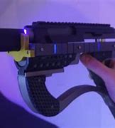 Image result for Futuristic Laser Gun