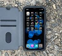 Image result for iPhone 11 Pro Leather Flip Case OtterBox Strada