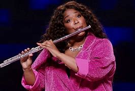 Image result for Lizzo Playing Flute Meme