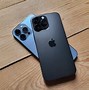 Image result for Back On iPhone 14 Pro Max Black Guy Holding