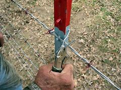Image result for Barb Wire Fence Building