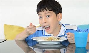 Image result for Chinese Boy Eating Apple