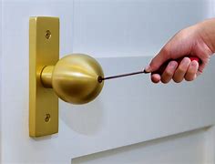 Image result for How to Unlock Door Knob with Hole