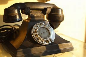 Image result for Old Fashion Gold Ring Telephone