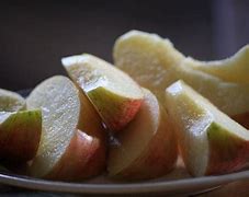 Image result for A Picture of a Sliced Apple On a Textured Surface