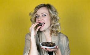 Image result for Lady Eating Candy