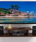 Image result for Solid Wood TV Unit Wall Mounted