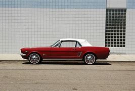 Image result for cherry red mustangs