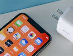 Image result for iPhone Fast Charger in Hand