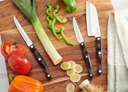 Image result for Chef Knife Cutting Vegetables