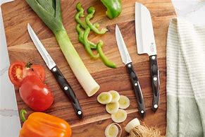 Image result for Chef Knife Cutting Vegetables