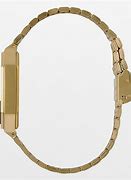 Image result for Nixon Gold Digital Watch