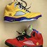 Image result for Blue and Yellow Jordan 5s