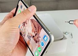 Image result for How to Take Sim Card Out of iPhone