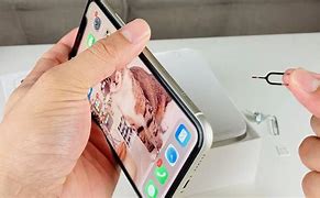 Image result for iPhone 11 Remove Sim Tray