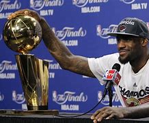 Image result for LeBron Holding Trophy in Miami