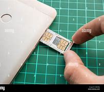 Image result for Picture of iPhone SE with Dimension in Inches Showing Sim Tray