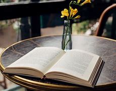 Image result for Book On a Table