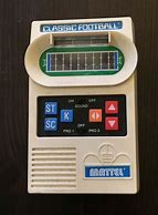 Image result for electronic football game handheld