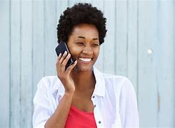 Image result for Black Woman Smiling at Phone