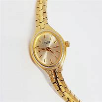 Image result for Quartz Watch Gold