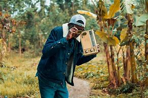 Image result for Outside Holding Up a Boombox