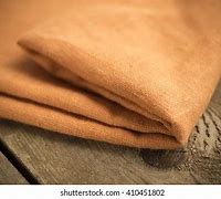 Image result for Fine Orange Cloth Folded