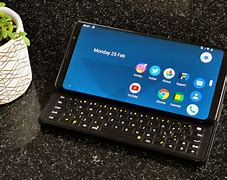 Image result for Green Phone with a Flip Out Keyboard
