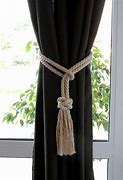 Image result for How to Put Up Curtain Tie Back Hooks
