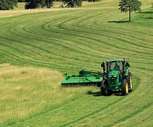 Image result for Mowing Tractor