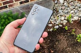 Image result for Someone Holding a Samsung A32 5G