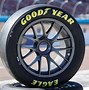 Image result for NASCAR with Wheels On Side