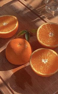 Image result for Orange Fruit On Green Grass Aesthetic